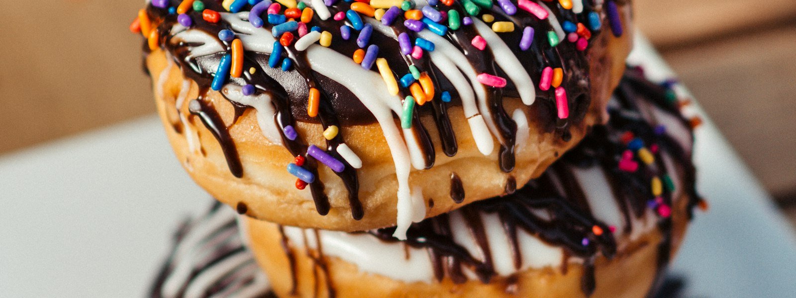 Assorted glazed and frosted donuts