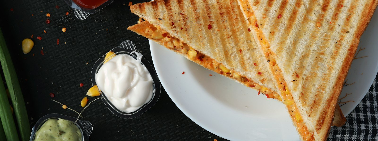 Toasted hot sub sandwich stacked with meat and melted cheese