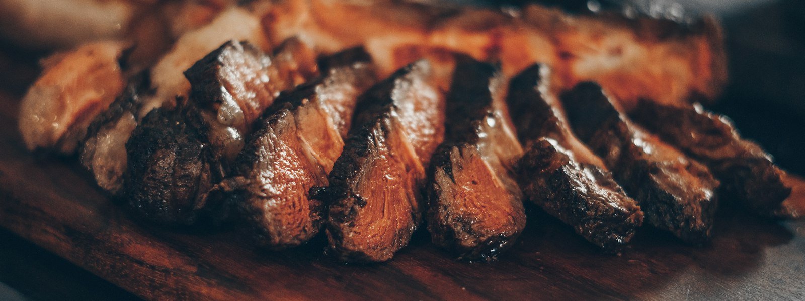 Fire grilled steak dinner with a side