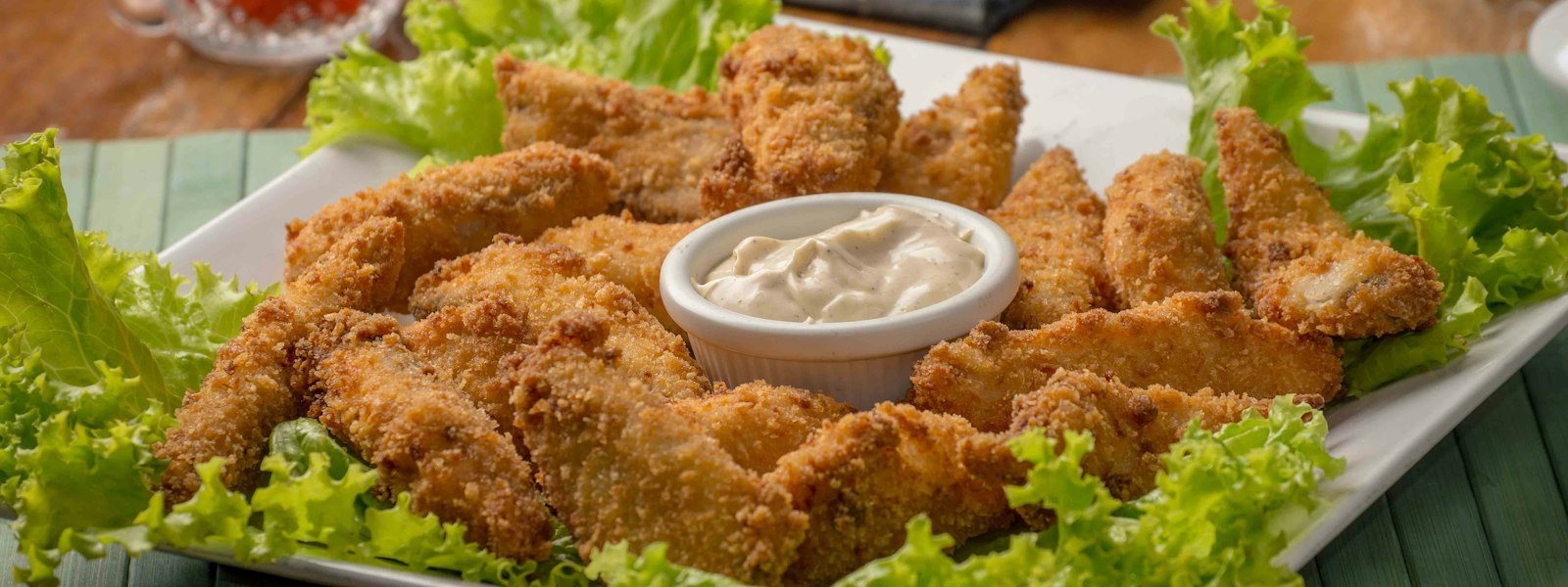 Spicy Louisiana style fried chicken with fries